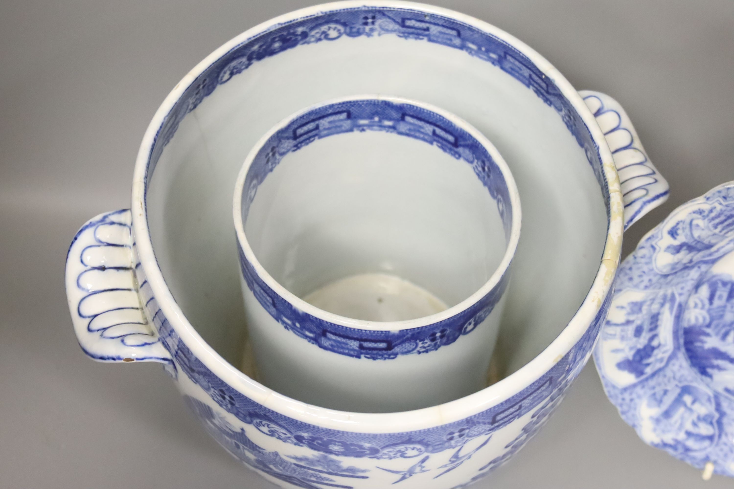 A Victorian blue-printed earthenware wine cooler (a.f.) 18cm high and a Victorian pearlware plate